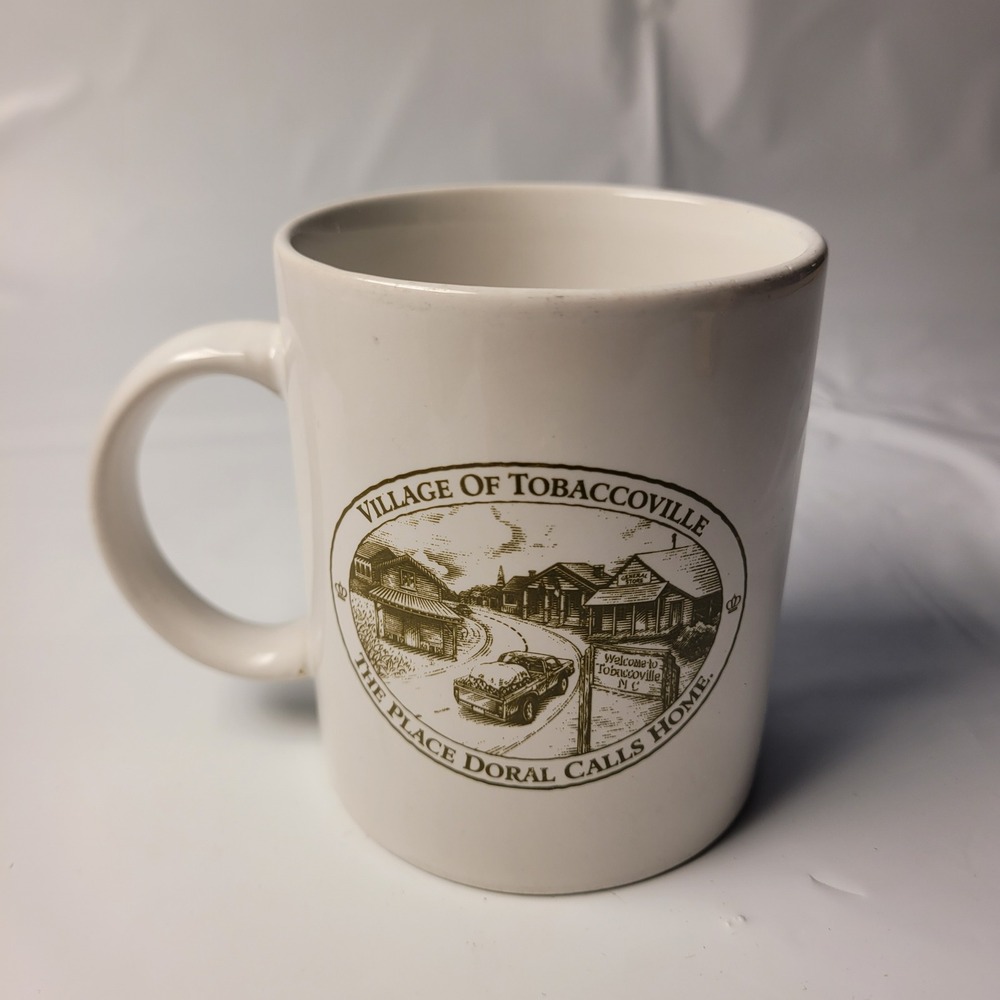 RJRTC Coffee Mug Village of Tobaccoville NC Doral Tobacco Souvenir White